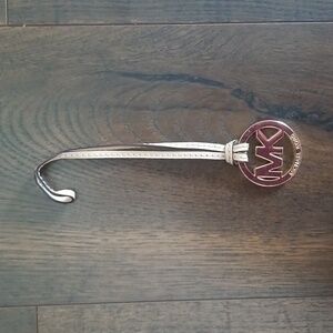 Michael Kors beige handbag tag